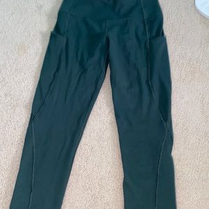 iuga leggings, teal color with pockets on the side